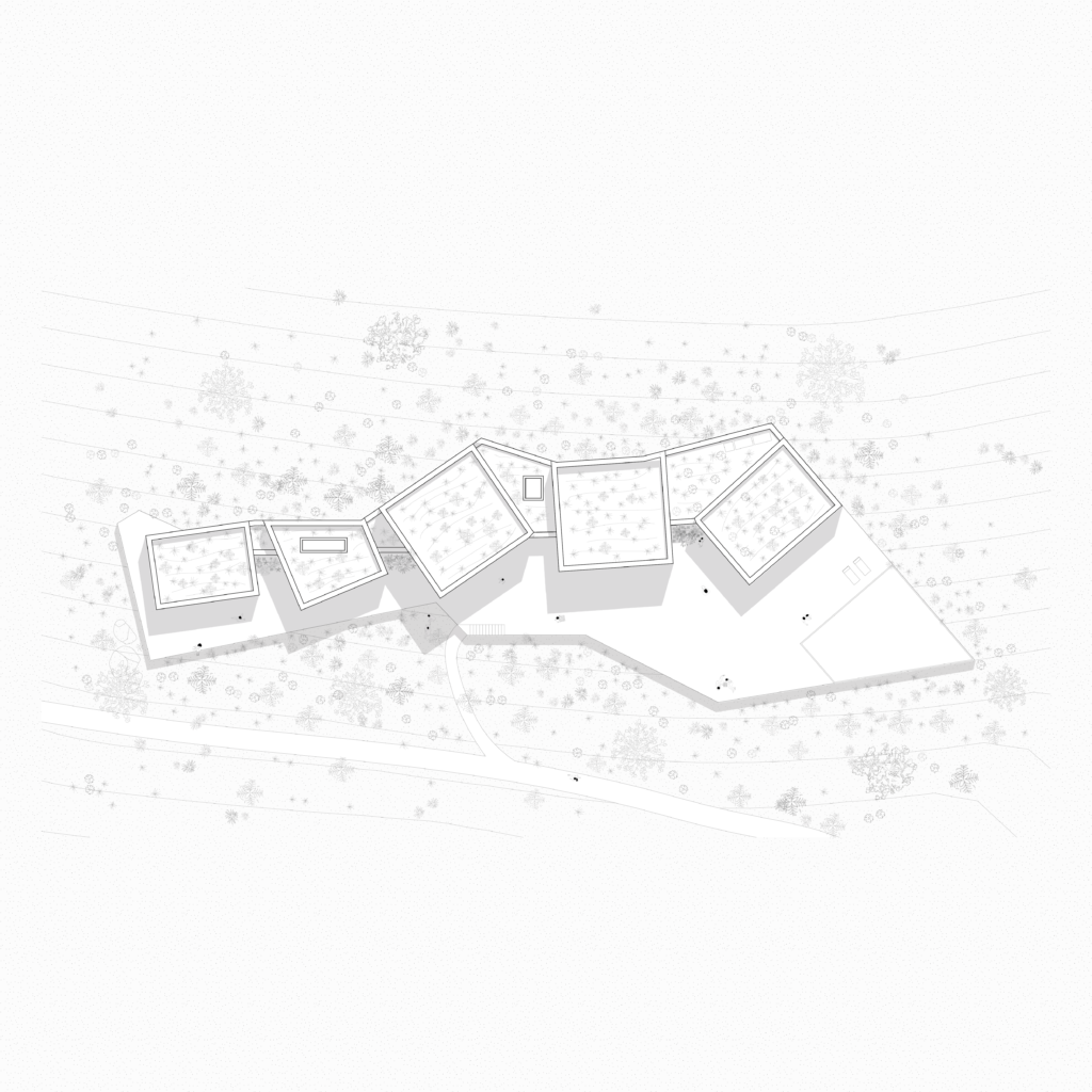 Overall plan of Camel Cave Visitors Center illustrating the distribution of volumes and shared program across the site.