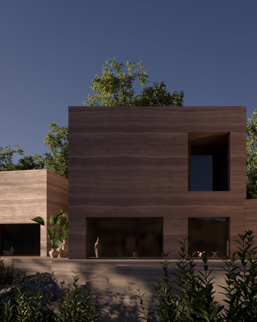 Front-facing rammed earth volume with deep-set openings at Camel Cave Visitors Center.