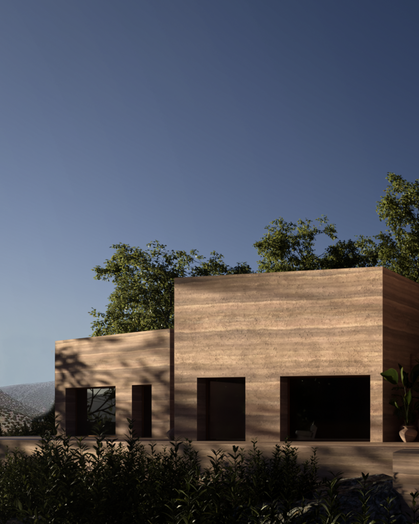 Light-toned exterior block of Camel Cave Visitors Center showing restrained openings and monolithic geometry.