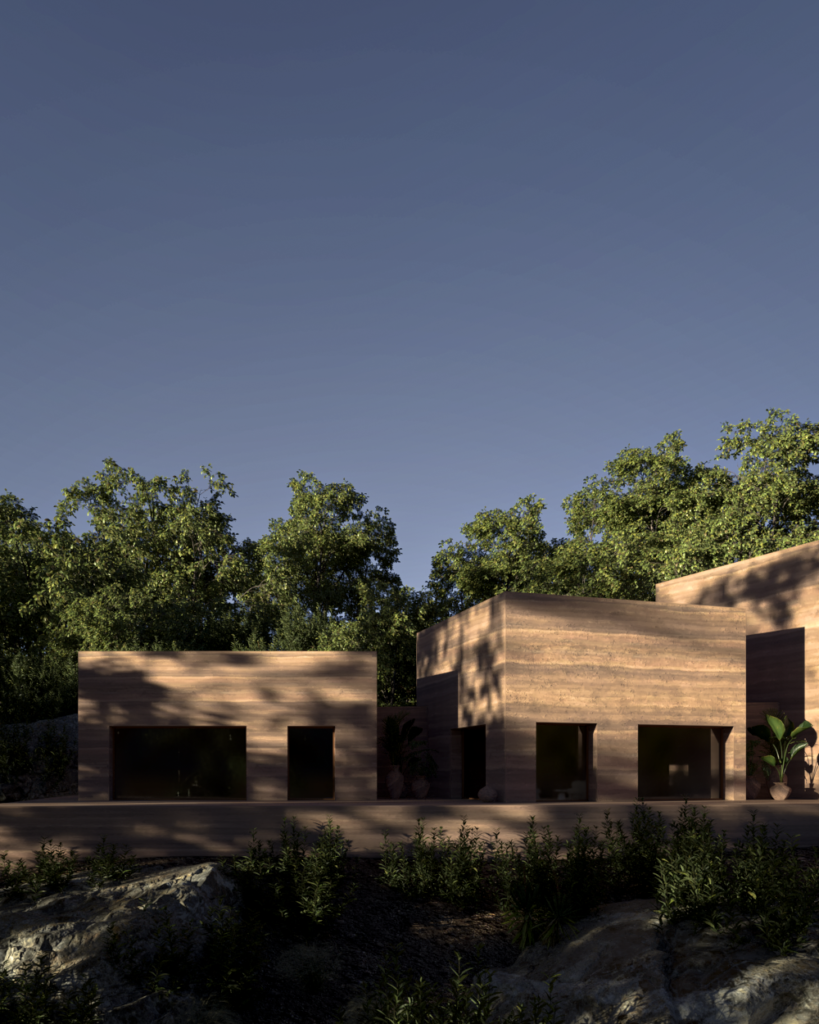 Multiple rammed earth volumes of Camel Cave Visitors Center composed like a contemporary mountain settlement.