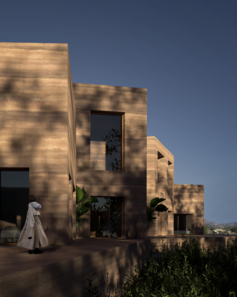 Angular earthen volumes of Camel Cave Visitors Center aligned along the mountain edge.