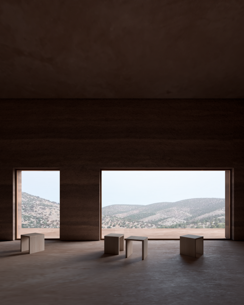 Quiet interior at Camel Cave Visitors Center with large framed openings overlooking the Berkane Mountains.