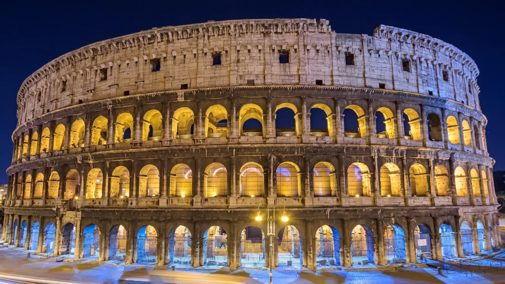 night view of the iconic roman colosseum